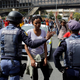 Students face off with police.